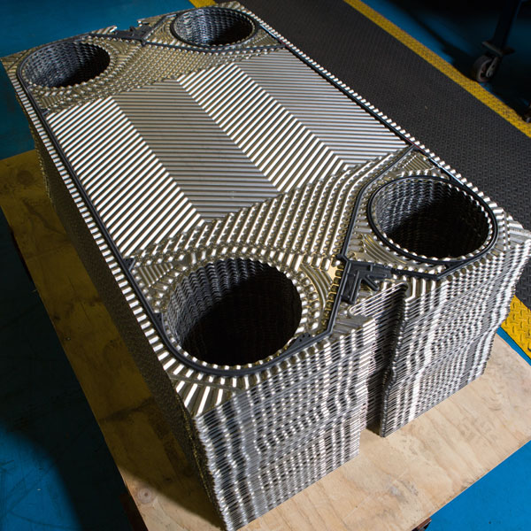 Plate pack exchange for plate and frame heat exchanger